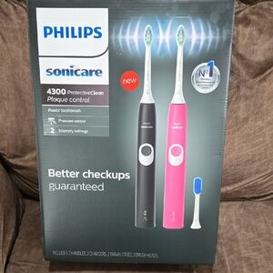 Philips Sonicare Electric Toothbrush Set - Black and Pink
